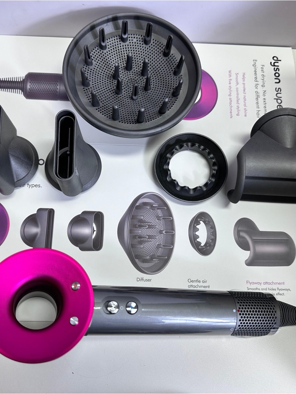 Dyson Hair Dryer in Pink and Gunmetal with Multiple Attachments